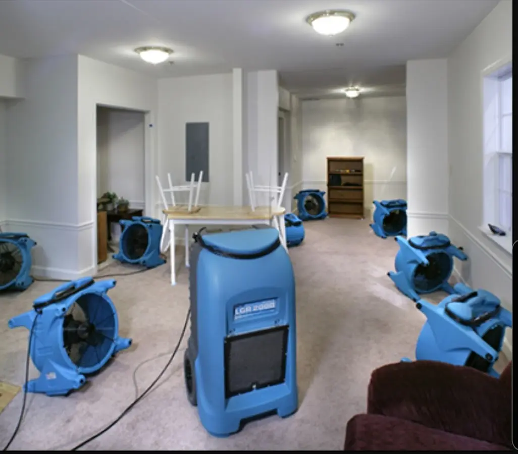 Air movers and dehumidifier setup for Water Extraction & Removal in Winters